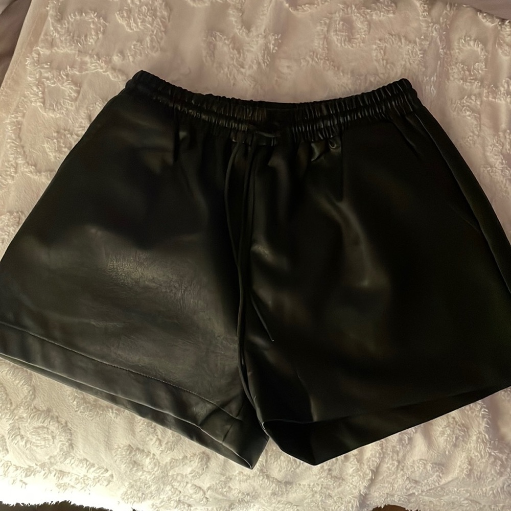 Trendy black leather shorts